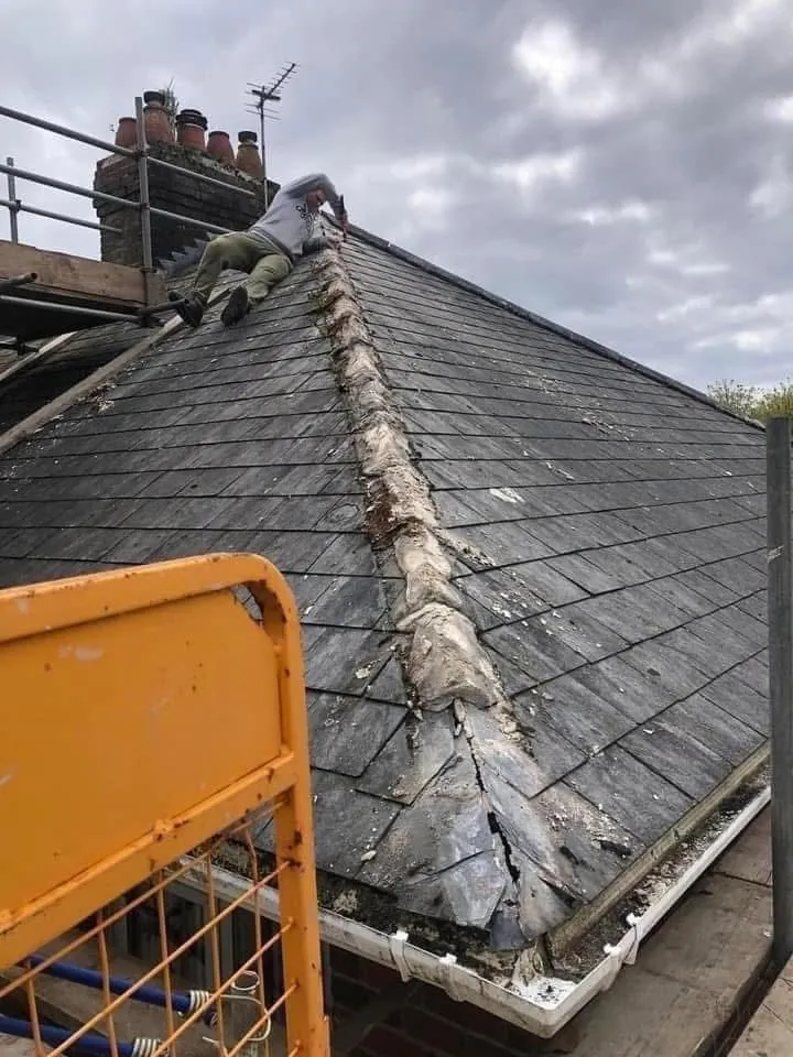 Slate roof ridge and chimney repair in Fowey